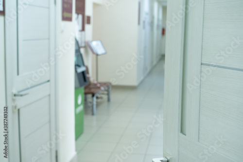 Hospital corridor with open door