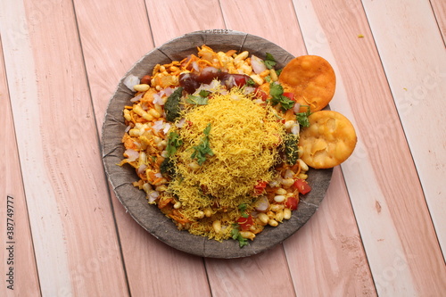 Bhelpuri Chaat/chat is a road side tasty food from India, served in a plate.