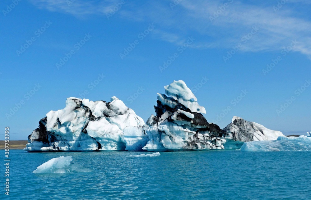 custom made wallpaper toronto digitalMajestic glacial lake Jokulsarlon lagoon with huge icebergs and blue ice floes, white sparkling snow, winter northern fairy tale of Iceland.