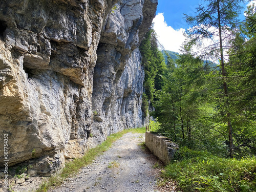 Trails for walking, hiking, sports and recreation along the waterfalls Giessbach Falls (Giessbachfälle oder Giessbachfaelle) and in the creek valley, Brienz - Canton of Bern, Switzerland / Schweiz photo