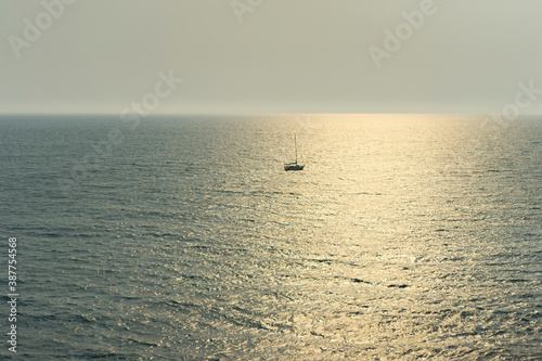 Beautiful sunset on the sea and lonely boat in Montenegro photo