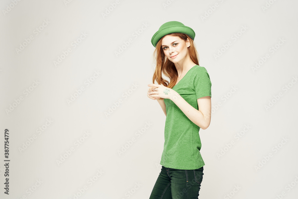 Holidays St. Patrick's Day pretty woman with shamrock on her hand Holidays St. Patrick's Day pretty woman with shamrock on her hand