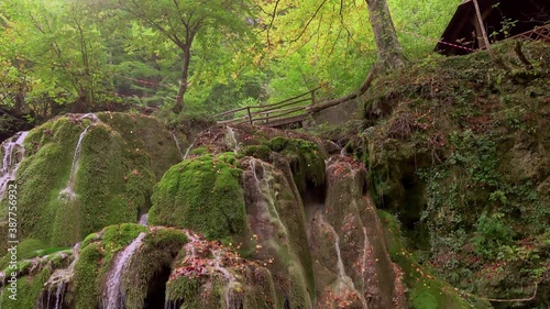The unique beautiful Bigar waterfall full of green moss, Bozovici, Caras-Severin, Romania. 