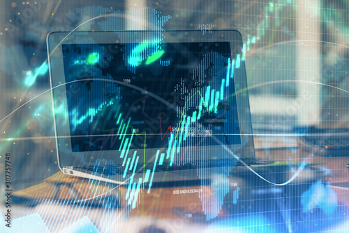 Wallpaper Mural Stock market chart hologram drawn on personal computer background. Multi exposure. Concept of investment. Torontodigital.ca