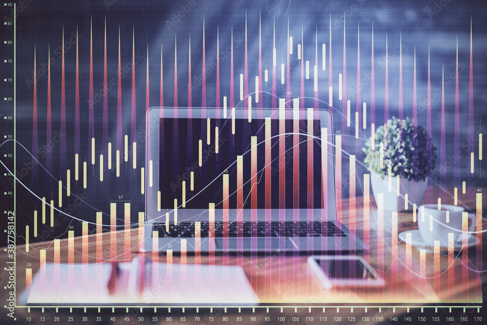 Financial chart drawing and table with computer on background. Double exposure. Concept of international markets. Financial chart drawing and table with computer on background. Double exposure. Concept of international markets.