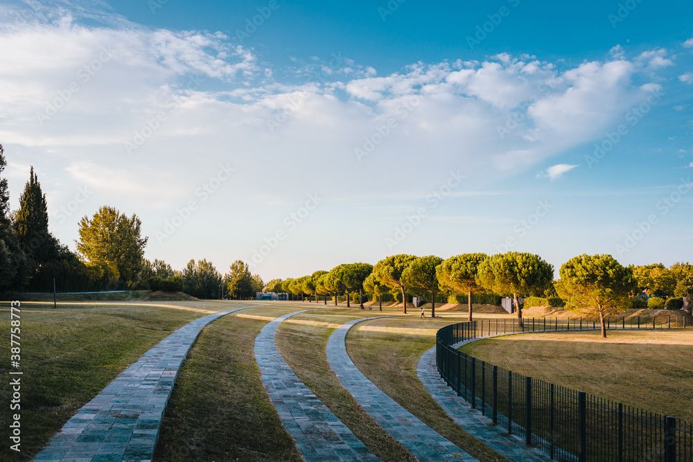 Ravenna / Italy - August 2020: Symmetrical view of the park of the Mausoleum of Theodoric