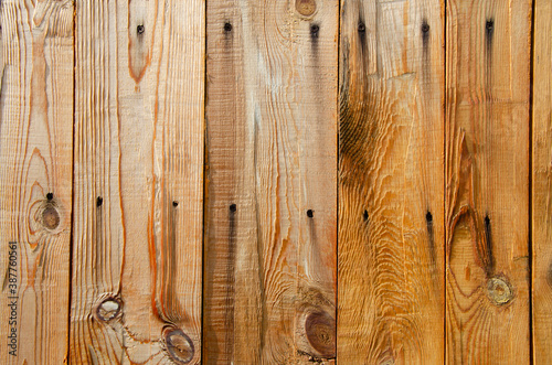Background from wooden boards with old nails and rust stains. Suitable for backgrounds or text.