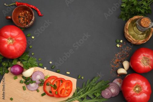 vegetables and spices on blackboard