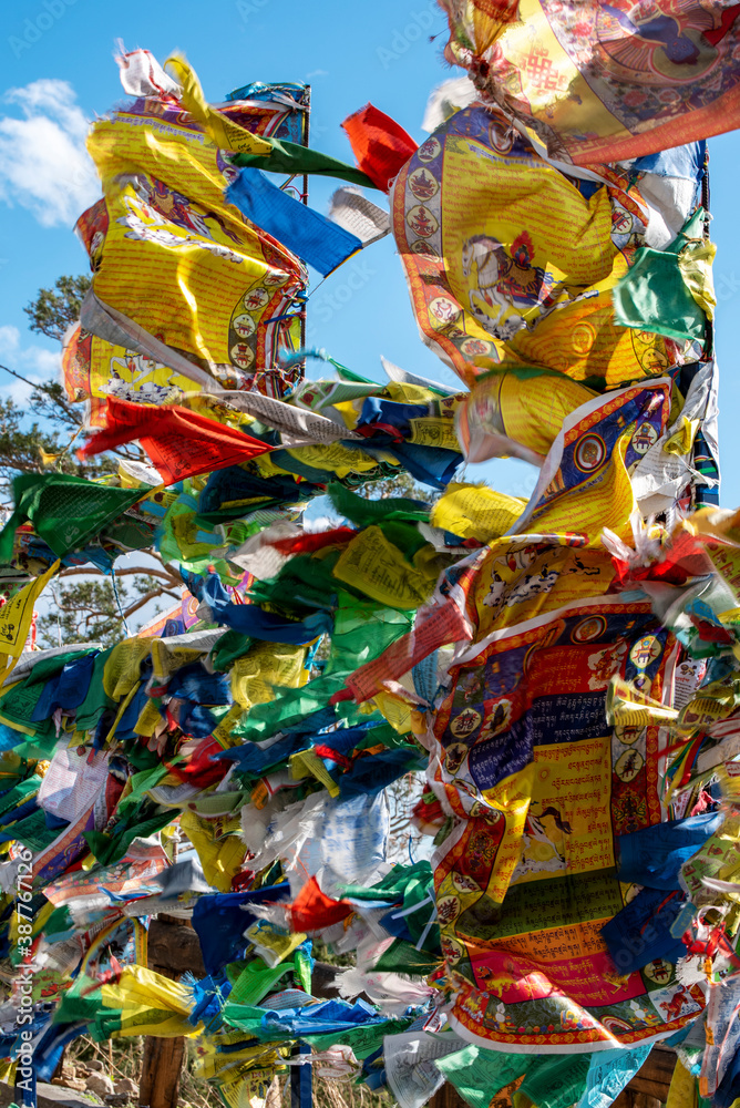 Buddhist prayer flags waving in the wind