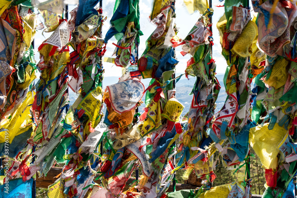 background of Buddhist prayer flags in the wind