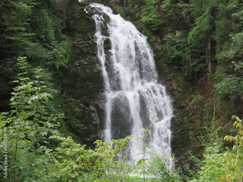 Giessbach Falls in the eponymous nature park and over Lake Brienz / Giessbachfälle (Giessbachfaelle) im gleichnamigen Naturpark und über dem Brienzersee - Canton of Bern, Switzerland (Schweiz) photo