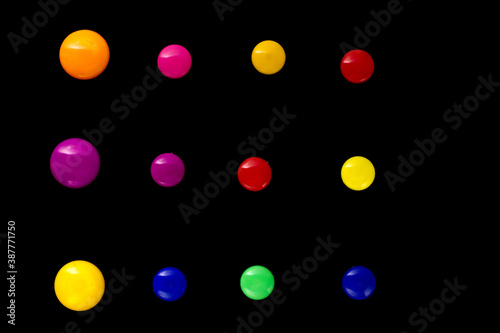 Magnetic paper clips grouped in stitches isolated on black background