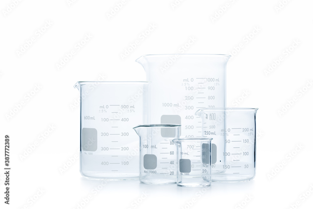 Mix size of measuring beakers for science experiment in laboratory isolated Mix size of measuring beakers for science experiment in laboratory isolated