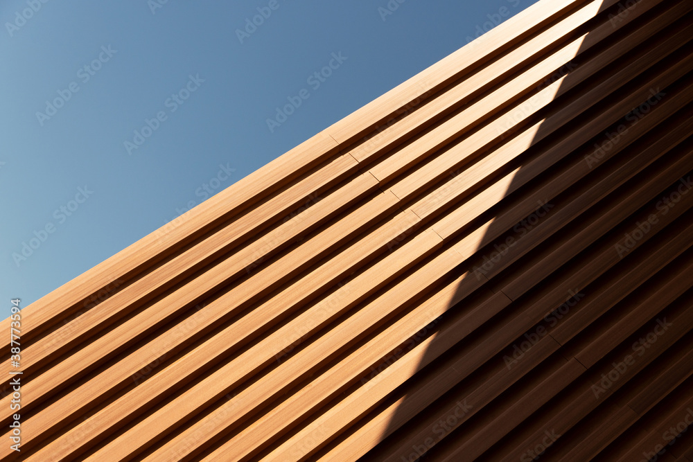 line of wood in detail building and blue sky abstract architecture background - obrazy, fototapety, plakaty 