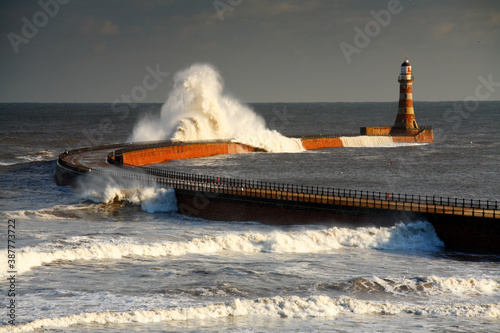 Huge Waves crashing against Roker Pier, Sunderland, Tyne and Wear, England, United Kingdom. photo