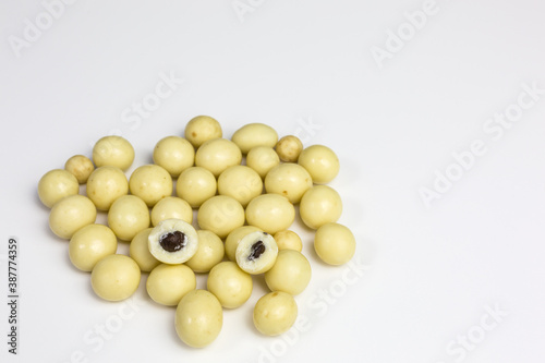 heap of white chocolate balls with coffee beans