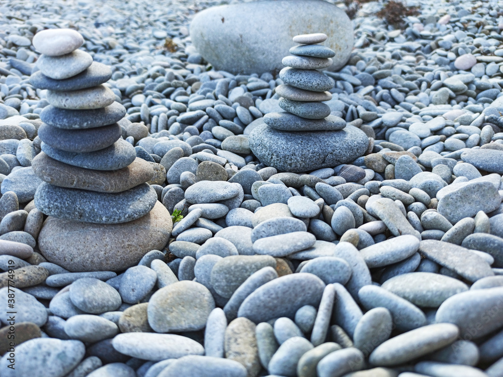 Stack of stones on a seashore. Concept of balance and harmony Stack of stones on a seashore. Concept of balance and harmony