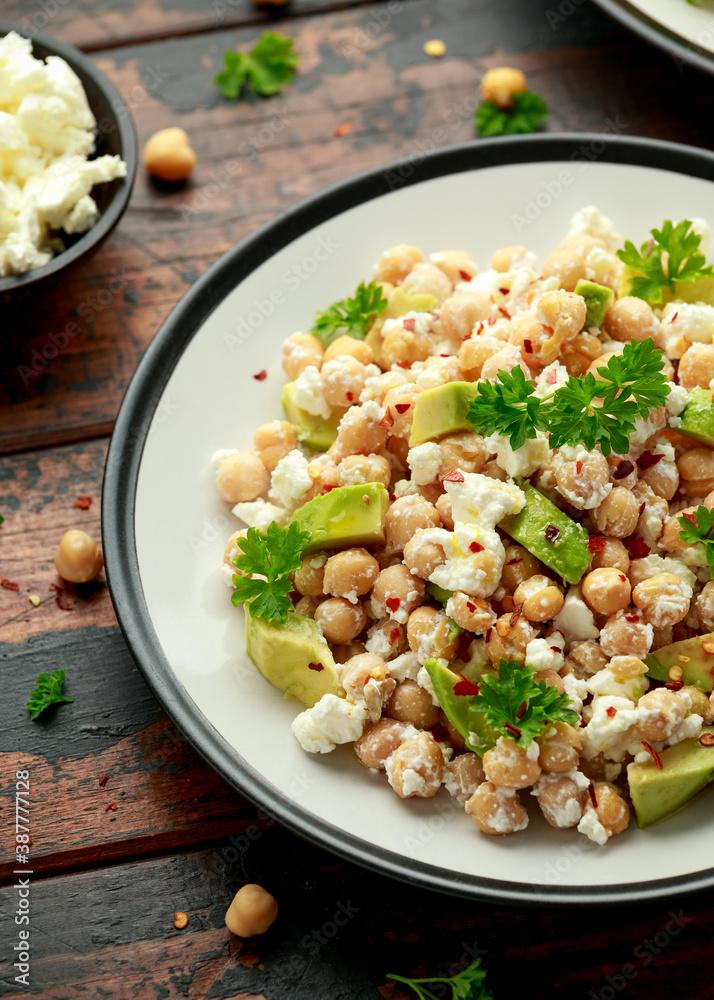 Chickpeas salad with feta cheese, avocado and herbs. healthy food Chickpeas salad with feta cheese, avocado and herbs. healthy food