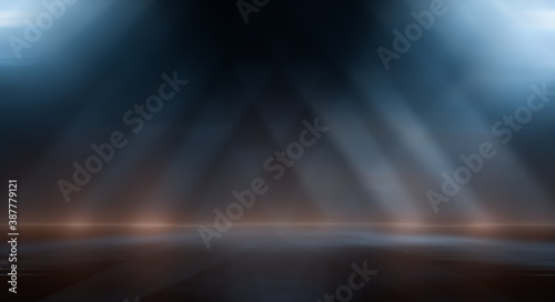 Modern minimalistic  futuristic studio background. Dark background with lines and spotlights  neon light  night view. Abstract blue background. Empty stage.