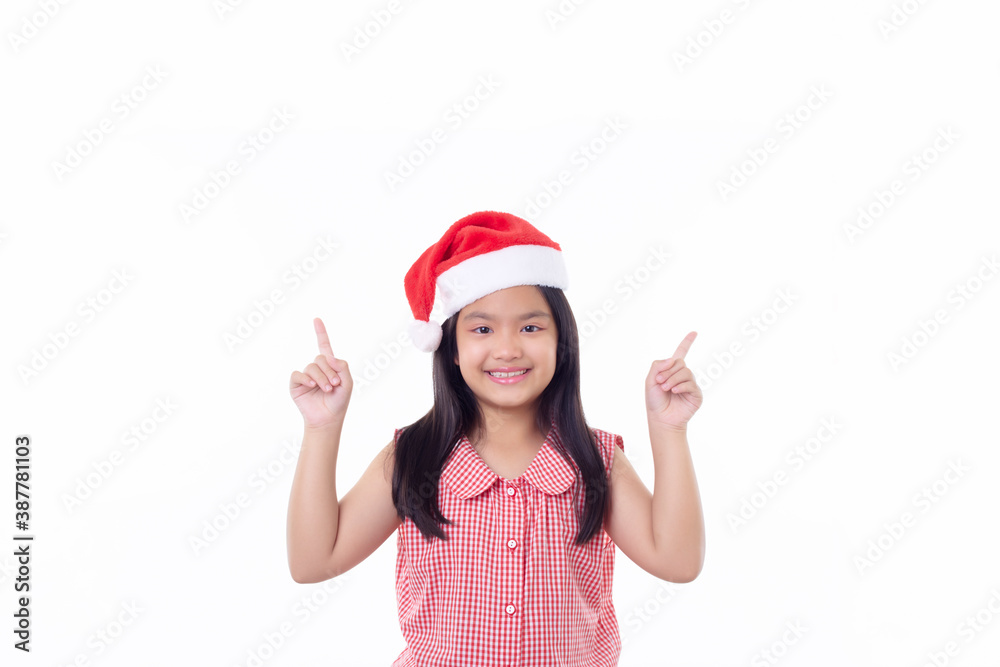 Asian girl wearing Santa hat Pointed to the side Asian girl wearing Santa hat Pointed to the side