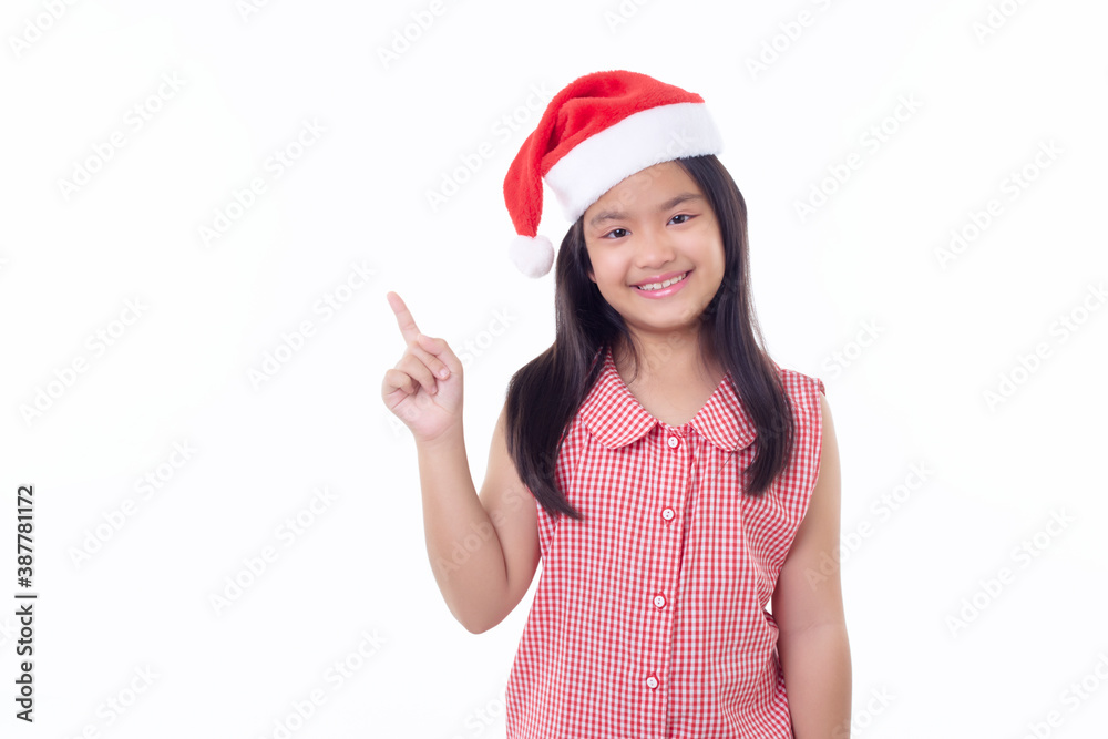 Asian girl wearing Santa hat Pointed to the side Asian girl wearing Santa hat Pointed to the side