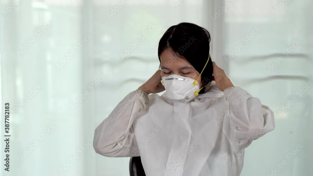 Doctors in PPE protective clothing demonstrated correct wearing of PPE kits to test for coronavirus covid-19 infection. Doctors in PPE protective clothing demonstrated correct wearing of PPE kits to test for coronavirus covid-19 infection.