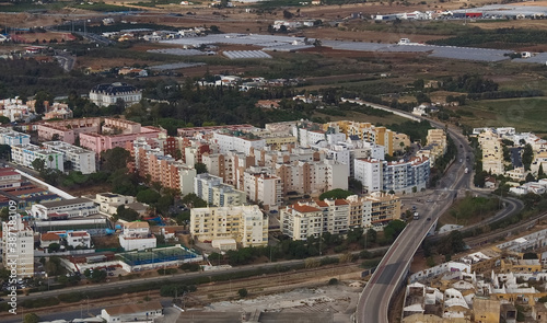 Aerial view of the city of Faro the beautiful Algarve coast in Portugal seen on a flight to Faro