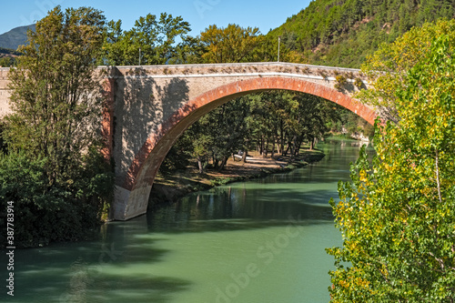 Arch bridge over the Metauro river in Fossombrone, Italy.