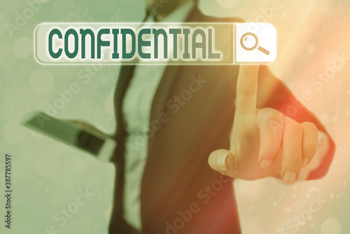 Conceptual hand writing showing Confidential. Concept meaning containing an individualal information whose unauthorized disclosure Web search digital futuristic technology network connection photo