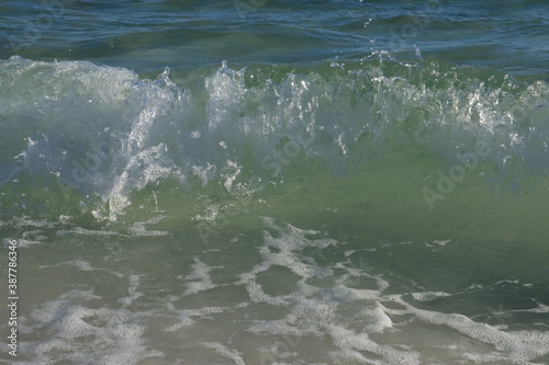 Small waves from the ocean near the shore