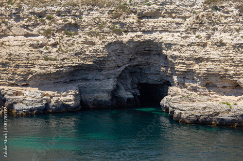 Caves along the sea. Beautiful seascape in summer. © karmad