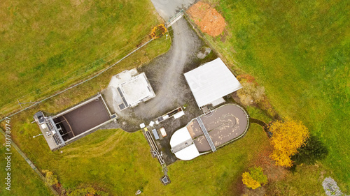 Aerial view of a small sewage treatment plant © philippschumach