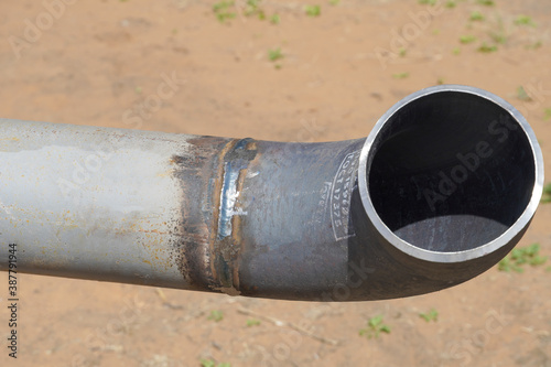 A butt weld of a process pipeline DN150 at an oil refinery. Manual arc welding.