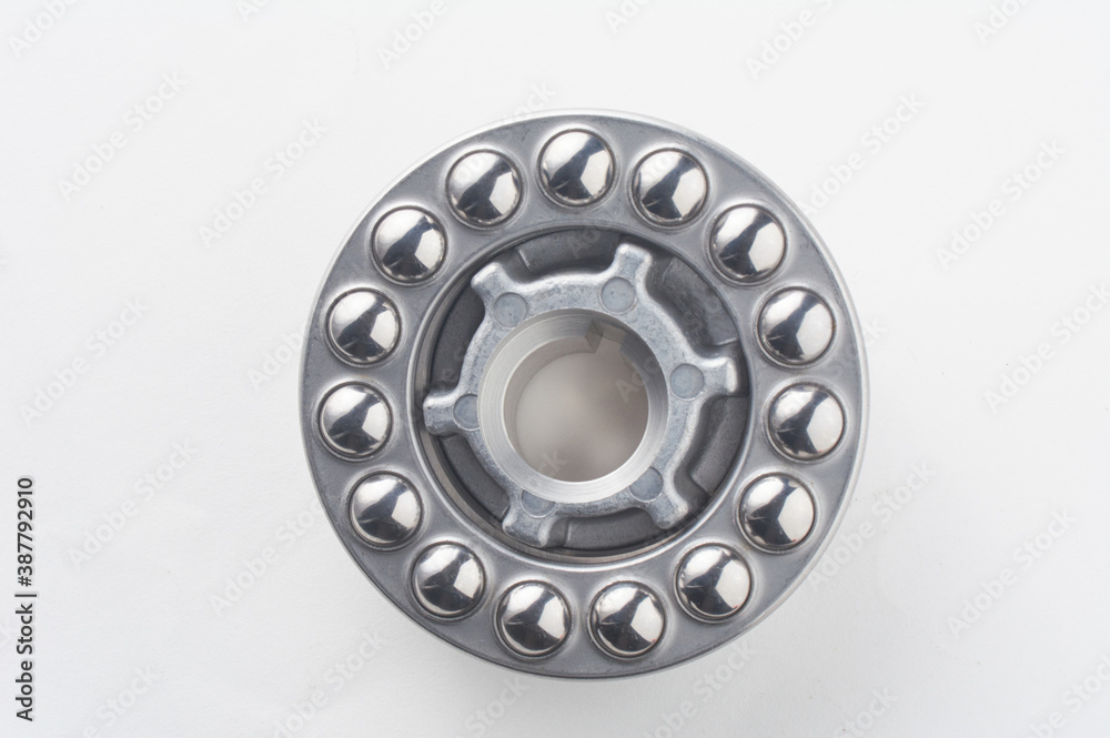 Metal Thrust Ball bearing isolated on white background. Spare part for heavy and automotive industry. Machinery concept. Metal Thrust Ball bearing isolated on white background. Spare part for heavy and automotive industry. Machinery concept.