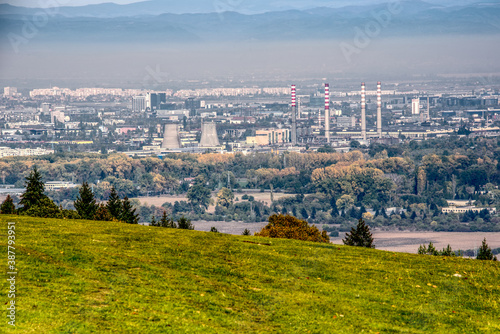 European capital city with chimneys and visible smog