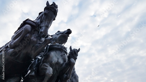 statue of horses galloping 