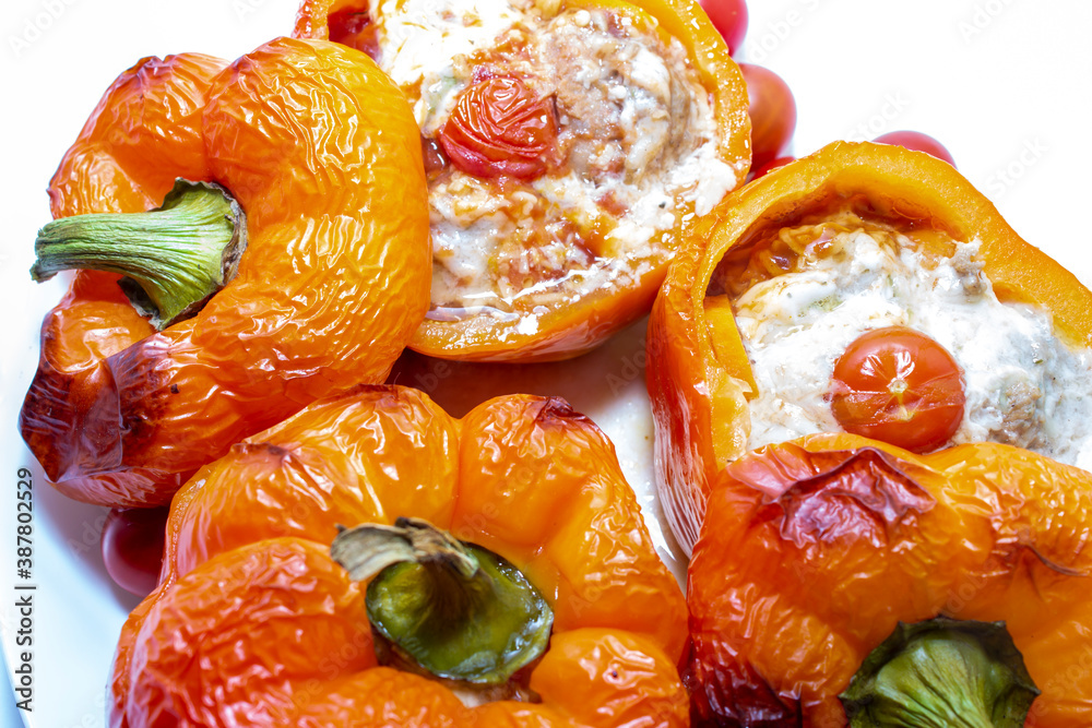 Stuffed with minced meat peppers. Top view on white background Stuffed with minced meat peppers. Top view on white background