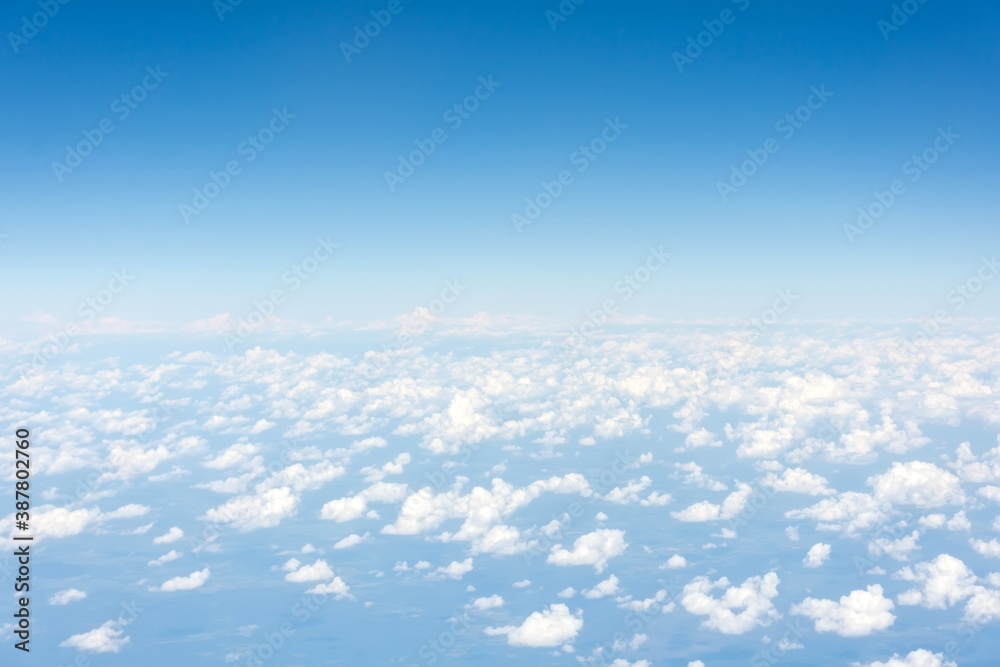 Light rare cumulus good weather clouds on a summer day, panorama view from a height. Light rare cumulus good weather clouds on a summer day, panorama view from a height.