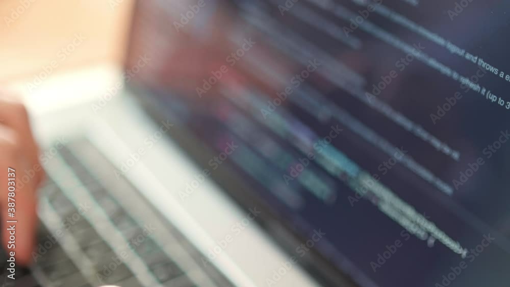 Hacker work online. Coder testing virus security system. freelance man design web software. Develop internet project. Closeup coding on screen, hands type html code and programming on screen laptop.