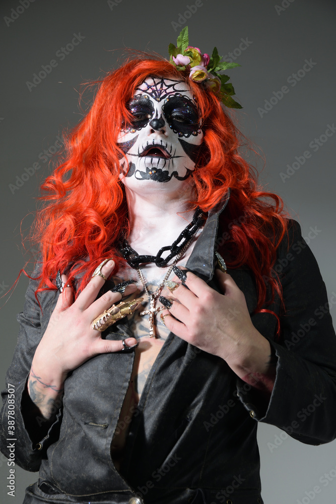 Zombie girl. Stodio portrait of female model with Halloween makeup. Halloween conception