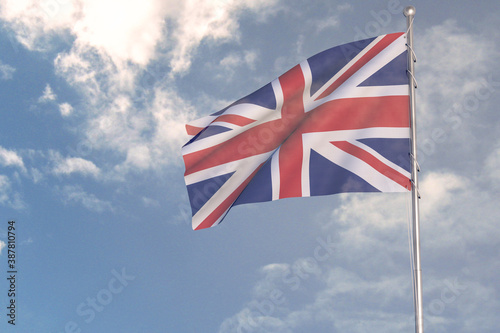 3d rendering of National Flag concept. Flag of Great Britain waving in wind. Blue cloudy sky on background. 