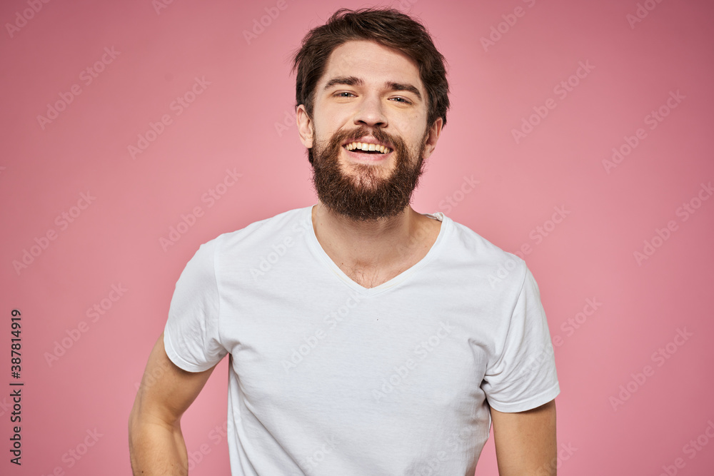 man in white t-shirt gesturing with his hands emotions fun pink background man in white t-shirt gesturing with his hands emotions fun pink background