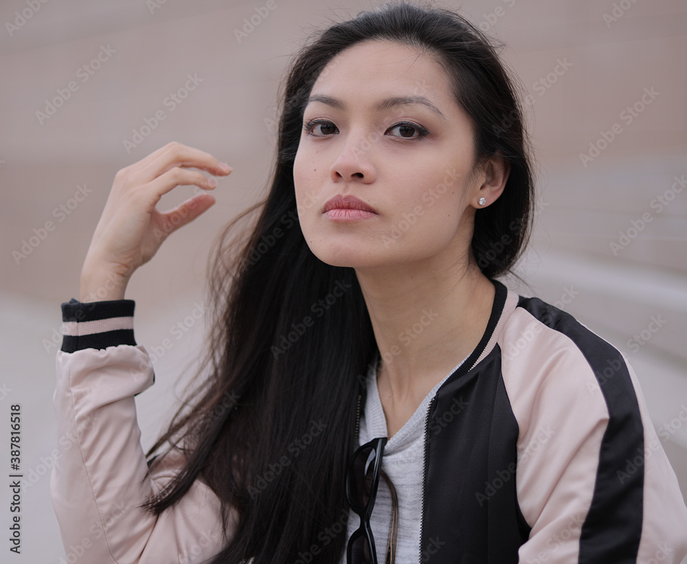 Pretty Asian girl in a city - close up shot - people photography Pretty Asian girl in a city - close up shot - people photography
