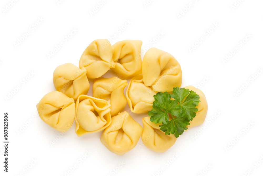 Raw homemade pasta,tortellini with herbs. Raw homemade pasta,tortellini with herbs.