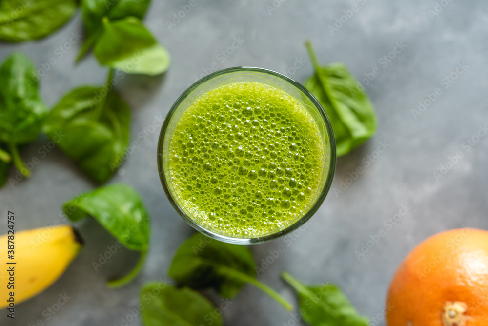 Spinach smoothie with orange, grapefruit and banana. Spinach smoothie with orange, grapefruit and banana.