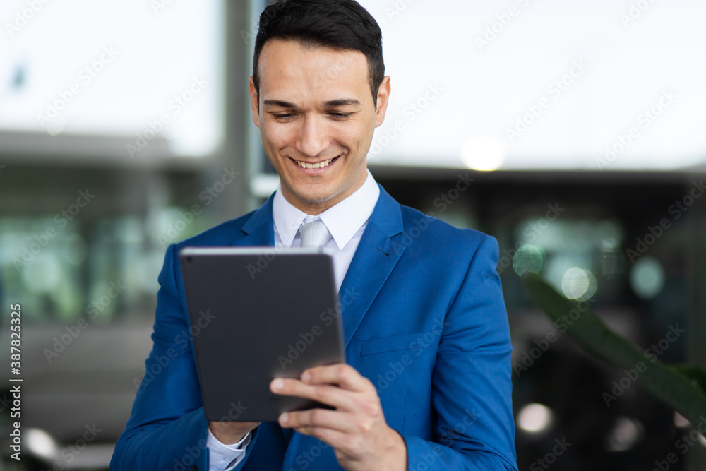 Young manager using a digital tablet outdoor Young manager using a digital tablet outdoor