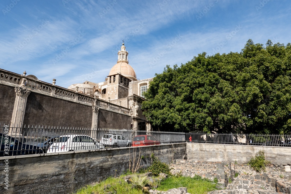 Terme romane, Terme dell Acropoli and Chiesa di San Nicolo Arena catholic church in Catania, Sicily, Italy at sunny day