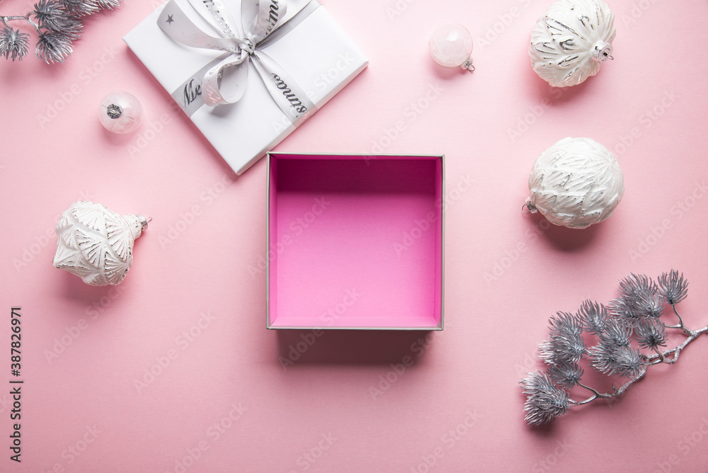 Merry Christmas and Happy Holidays greeting card, frame, banner. New Year. Noel. Christmas white silver ornaments and empty gift box on pink background top view. Winter xmas holiday theme. Flat lay
Merry Christmas and Happy Holidays greeting card, frame, banner. New Year. Noel. Christmas white silver ornaments and empty gift box on pink background top view. Winter xmas holiday theme. Flat lay