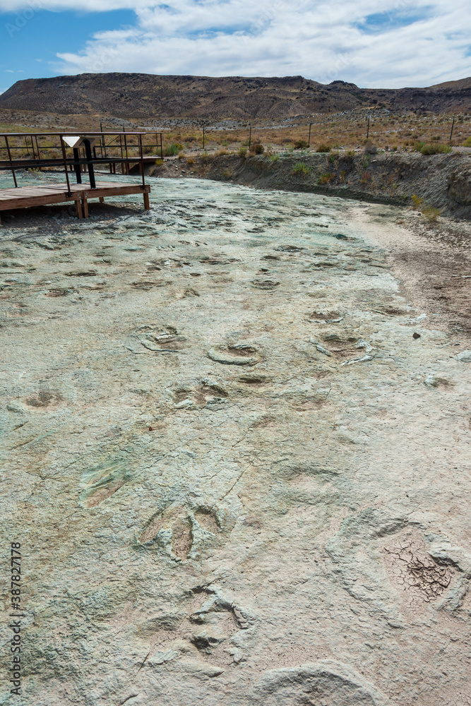 Dinosaur fossil tracks in the desert of Utah at Mill Canyon Dinosaur Tracksite near Moab Dinosaur fossil tracks in the desert of Utah at Mill Canyon Dinosaur Tracksite near Moab