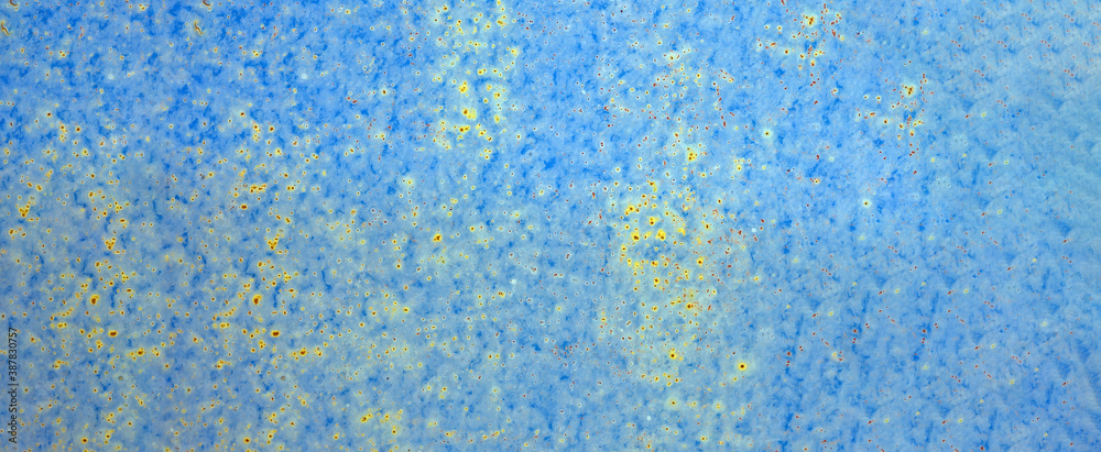 background: rusty metal surface with blue paint flaking and cracking texture. web panorama banner with copy space.